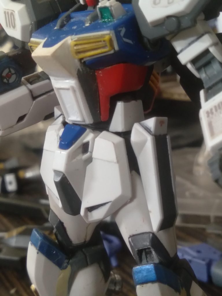 Plastic plate was used along with putty to reshape the torso to my liking. I also made the chest sensor from scratch. The chest vents came from the hgbf lightning zeta.