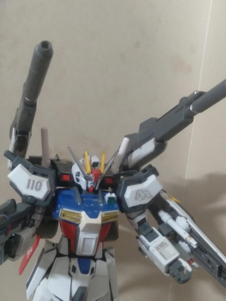 Using the aile pack as the base, I created a unique striker pack. The cannons are from the powered arms set. I added some barrels from the hgbf lightning gundam bws mk2. Beam saber handle storage was added on the back of the shield for easy access