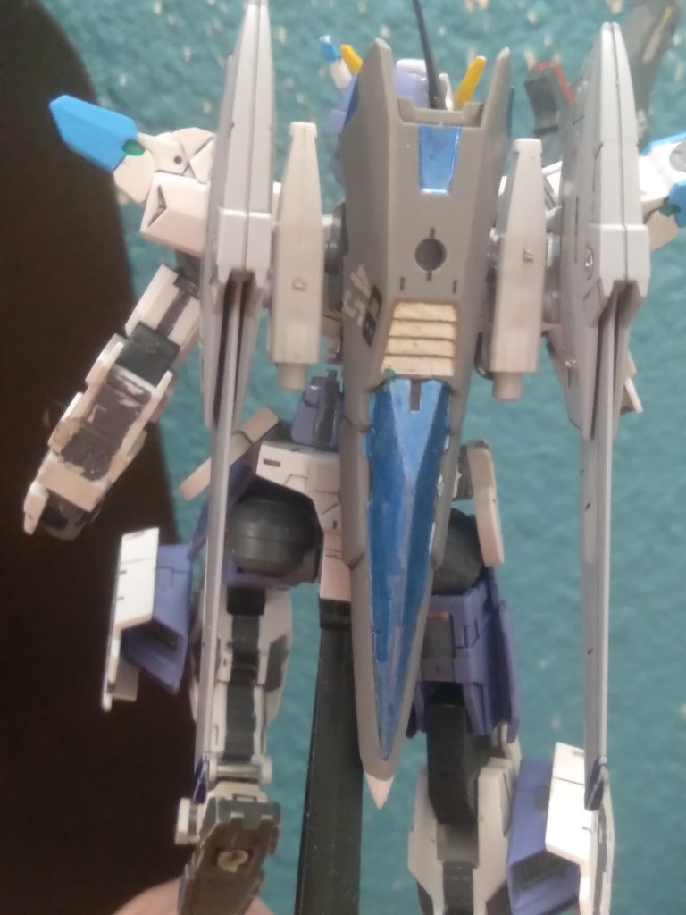 Here you can see the parts I used for the backpack and where the feet peg into in the alt mode. The espossito shield is also used here as the nose section. It rotates when it transforms to be out of the way