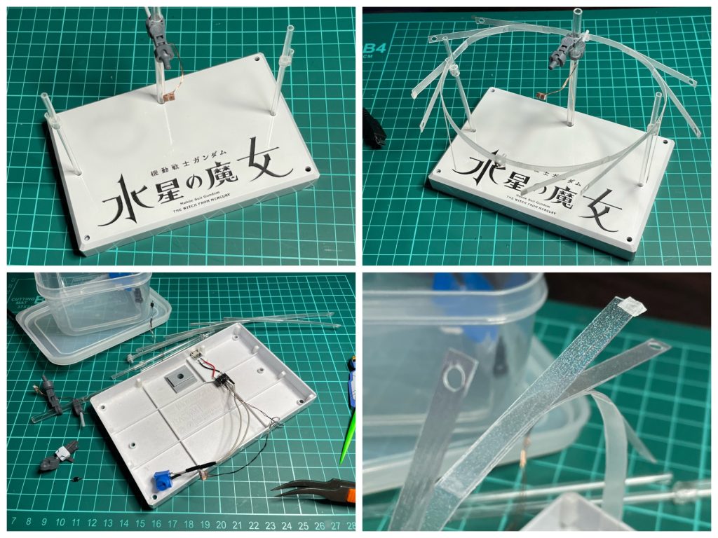 秋のイベント Gundam Next Future Tokyo Base 来場特典の「水星の魔女」台座を加工して、マイクロUSB給電ポート付きの台座を作成しました。プラの透け感を消す為、一旦グレーで塗装してから白を塗って、その上に光沢クリアーを塗って艶テカにしました。題字はタミヤエナメルのフラットブラックを筆塗りしてはみ出しを拭き取りました。ガンビット飛翔状態は0.4mm厚のクリアプラ板を貼り合わせて作成しました。青く発光させるために、ブラックライトルミネのブルーで塗装してます。さらにガンダムマーカーの月光蝶ホロシルバーを薄くかけてあります。月光蝶ホロシルバー、肉眼では虹色に見えますが、写真撮影時に複数光源で照らすとなかなか綺麗に見えませんね…😅回路に半固定抵抗を入れてあり、LEDの明るさを調節でき、手動で明滅させたりもできます。
