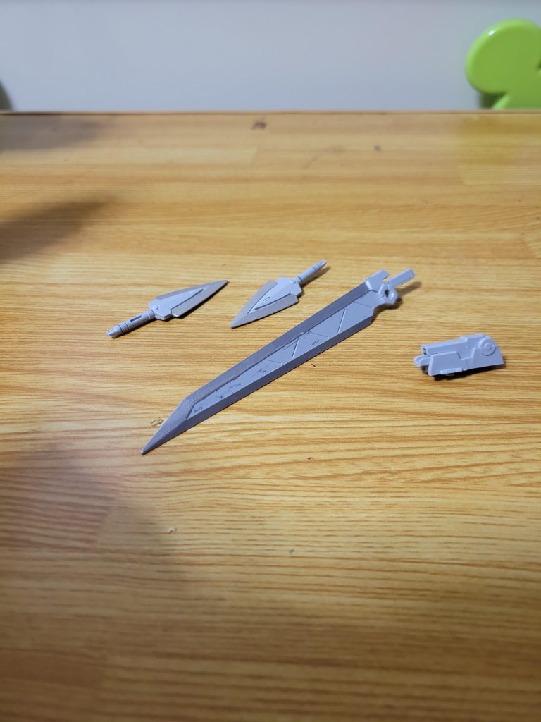 追加武装を1枚右腕に装備された1発限りのビームキャノン左腕 腰に装備されたEz8専用ダガーサイドアーマー?に装備されたEz8専用バスターソード両腕に持ってる100mmマシンガン