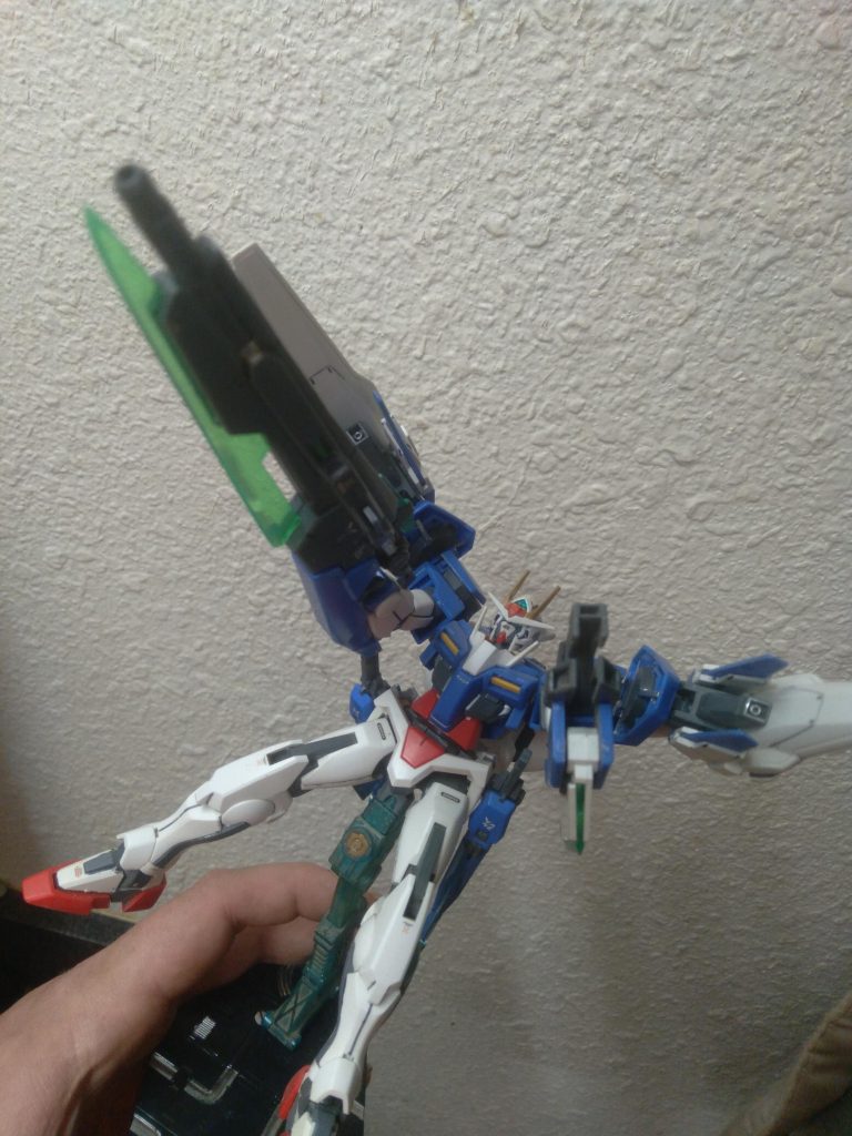 With the 0 raisers binders pointed forward and both the gn sword III and sword blaster aimed, it unleashed its most powerful attack. All the condensed particles release into the Raiser Sword, a massive beam that's can be controlled like a beam saber