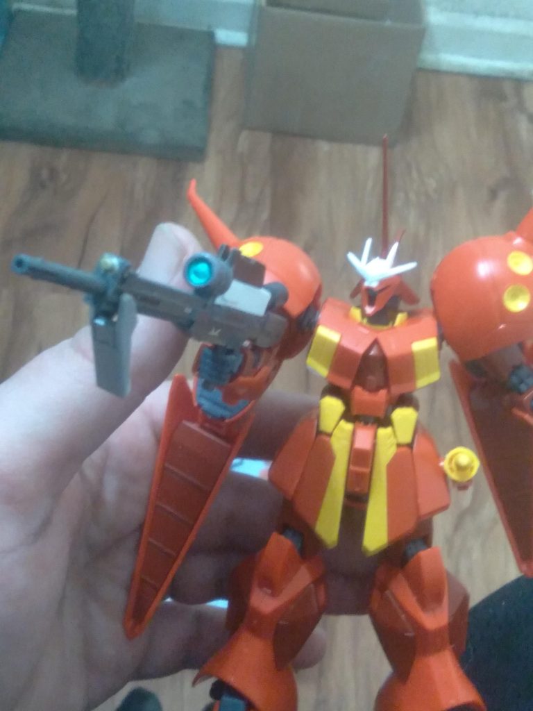 Here it is with the rifle I made the other day. This one looks better than the one that came with the kit