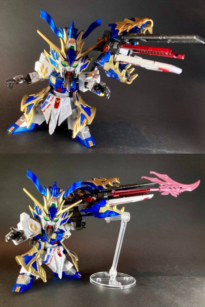 【青龍偃月砲】福岡関羽νガンダムの専用兵装。重量五万斤の超長砲身自律機動砲で、砲撃戦においては規格外の超射程・高火力により単騎での対艦戦闘も可能とする。また近接戦では砲身から巨大な青龍偃月刀のビーム刃を形成し、関羽本来の無双の大武勇で敵を圧倒する！