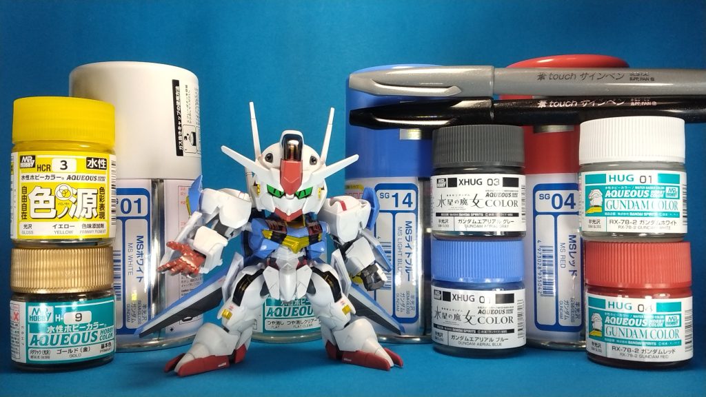 最後に、使用した塗料達と一緒に笑顔で(gundam-kao6)今回も缶スプレーをベースにして、細かい部分は水星カラーで筆塗りしました。水星コンの期間が、苦手な冬場と重なり塗装が間に合わないかと思いましたが、2月になってから暖かい日が増えてきたので、なんとかまたまたギリで完成しました💦水星の魔女アニメ第2期がとても楽しみですね!最後まで閲覧して頂きありがとうございました!!