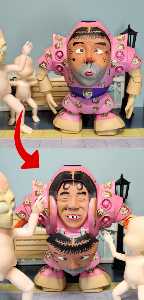 前後両面が同じフォルムのゾックその両面を利用して、もう片面は “変なおじさん”「だっふんだ」の顔が前に倒れると中から“ いいよなおじさん” 出現!