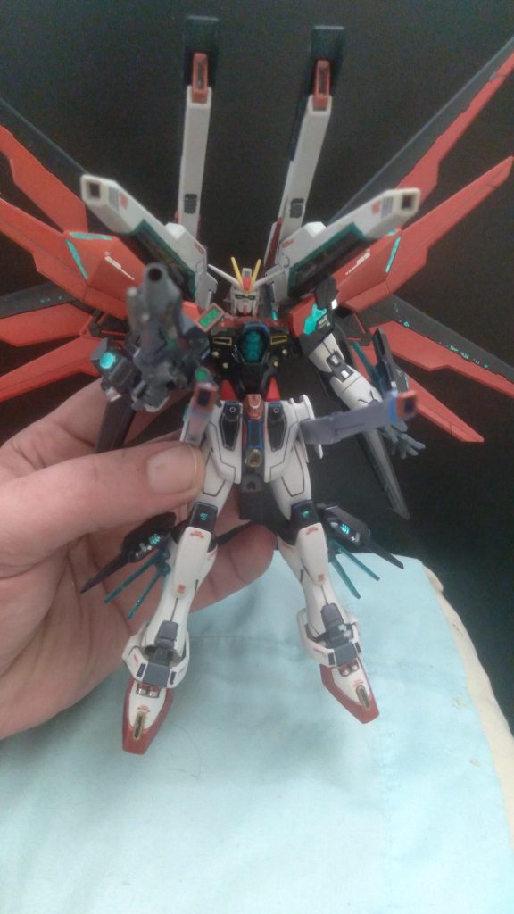 While it doesn't look bad like this, I want to make it more vibrant. I plan to use orange, yellow, white, gunmetal, and metallic blue for the psycoframe parts.