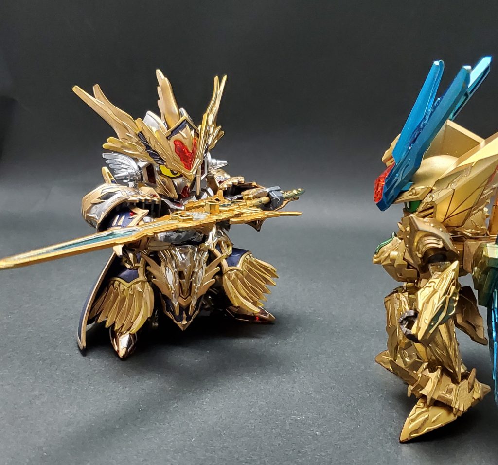 異世界からの帰還方法を探す2人はアーサーガンダムMk3と出会う。光と闇の勇者が表れし時世界は救われるという預言を知るアーサーは2人を予言に記された伝説の勇者だと思い、邪龍討伐の協力を依頼するが…