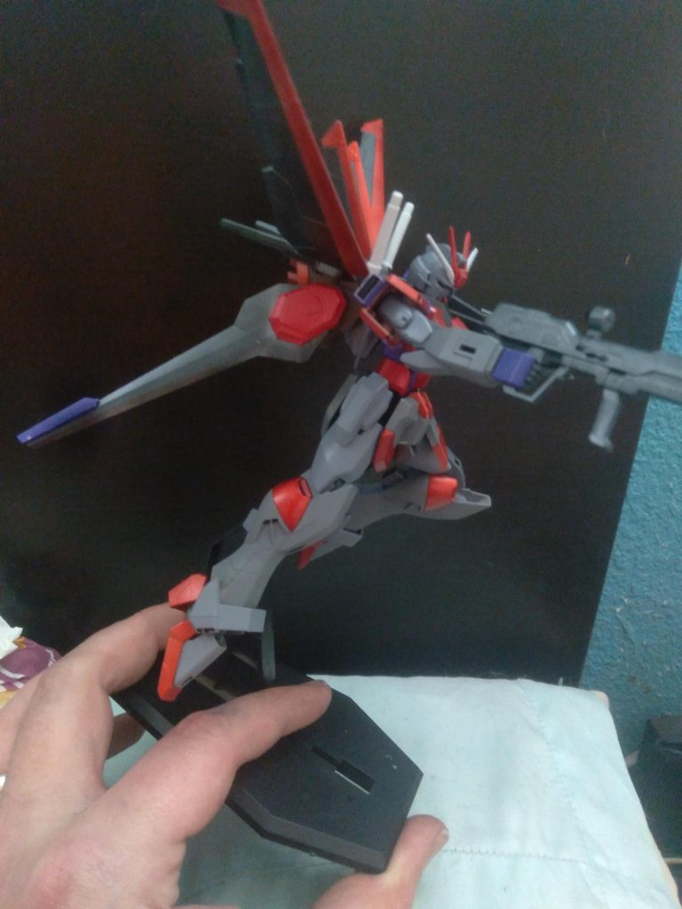 Side viewI also went in with black and a small brush and filled in some parts on the legs, shoulders, and torso. I still need to panel line and decal