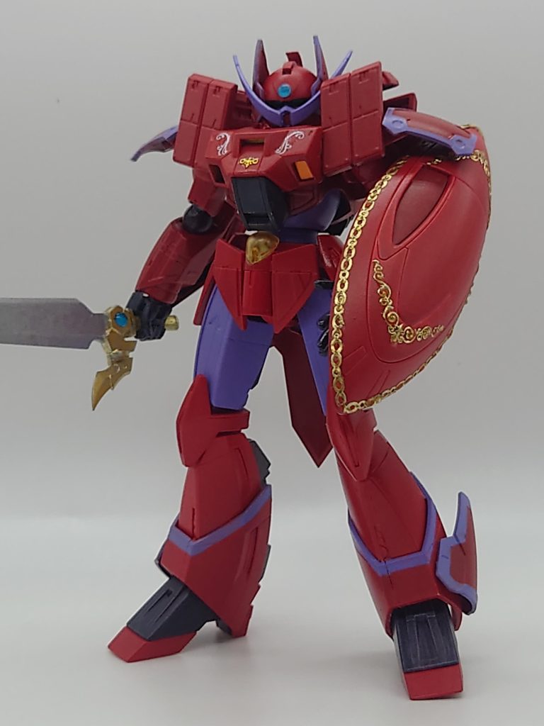 前作「邪シン兵」との対になる存在として誕生した「鉄巨シン」ということで、例によってOVA機甲界ガリアン「鉄の紋章」から主人公機の鉄巨神ガリアンをモチーフに、まさかの∀ガンダム降臨です！(笑)かたや必殺チートの「月光蝶」で文明終わらせるマン∀ガンダム、単騎で機甲兵全滅？に追い込んだ鉄巨神。ひとつの時代に終焉をもたらす存在として共通する部分があるというのが今作品の根っこになっております。 