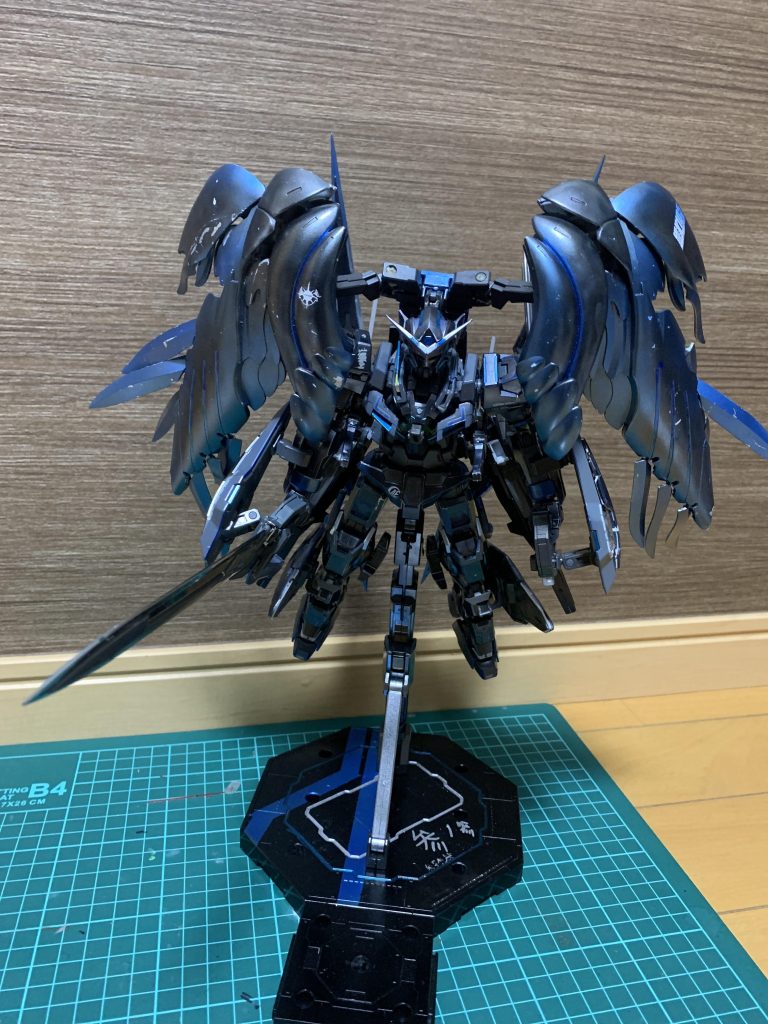 覚醒形態の前、全装備のスピード、近接戦闘を極大化した形態。まず両足にシールド及びGNコンデンサーを内蔵にして、ヴァーチェのGNフィールドを発生させる。両腕にGNソード2本搭載、近距離から遠距離の対応可能、ウィング、機動性の高い動きを補う。