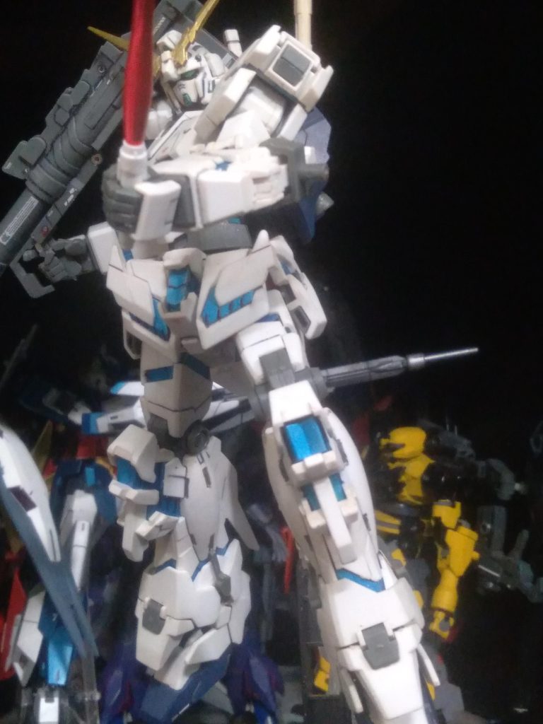 Slashing with the beam saber. I used a different handle because the unicorn ones are known to slide out of the hands