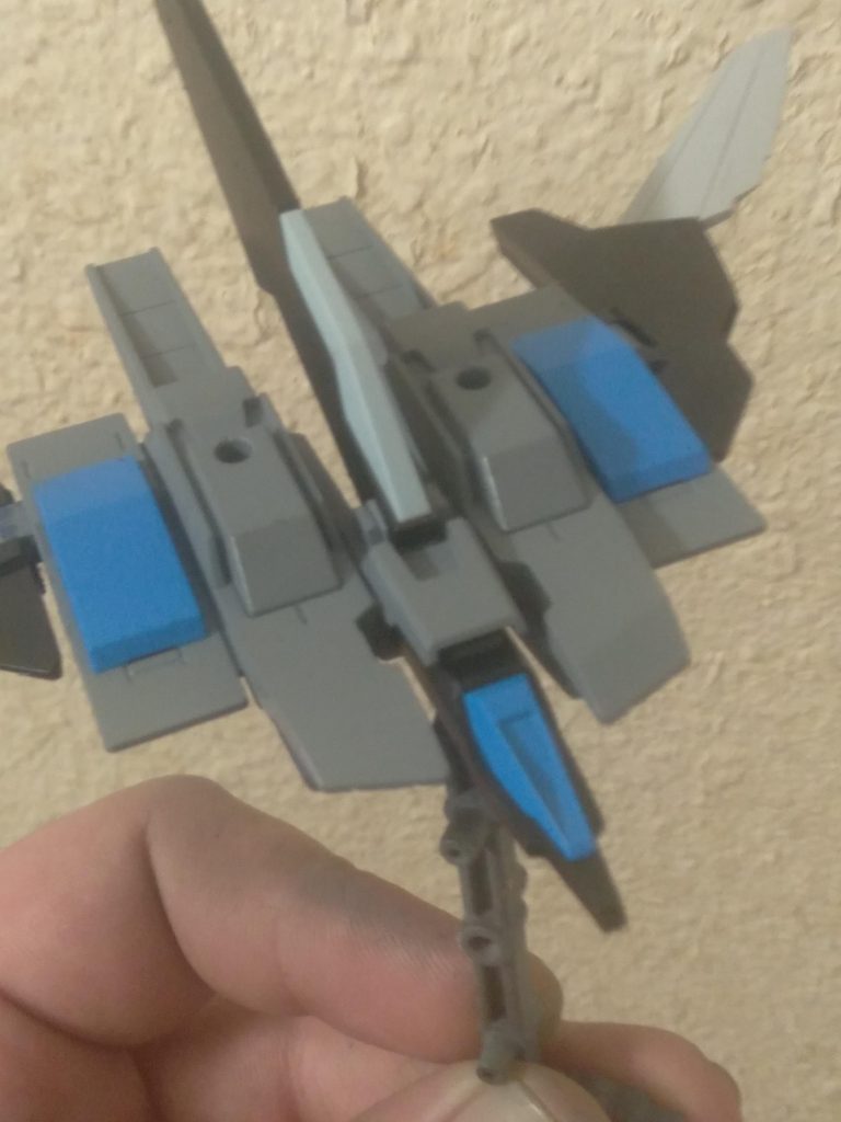 It can be operated a separate unit by the on board computer and can be outfitted with optional equipment. When docked with the Strike Impulse, it gives it a tremendous boost in mobility. It also can transform into a long distance cruising mode. There are 2 8 tube missile launchers under the blue panels.