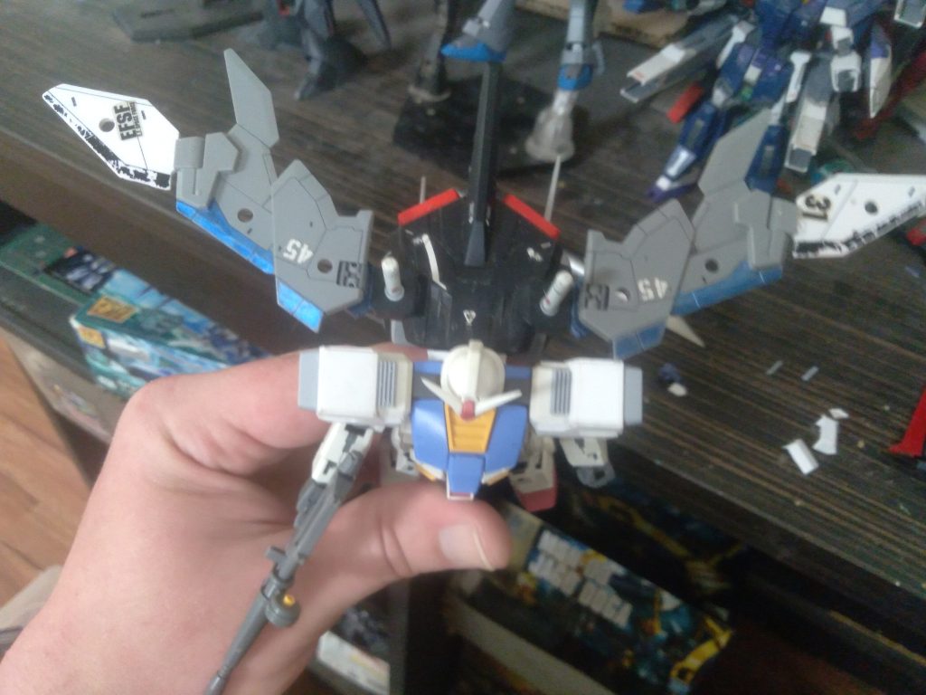 I used the perfect strike freedom backpack as the core of the this pack. Then using C-clips from the 30MM line, I was able to attach some wings from the air fighter.
