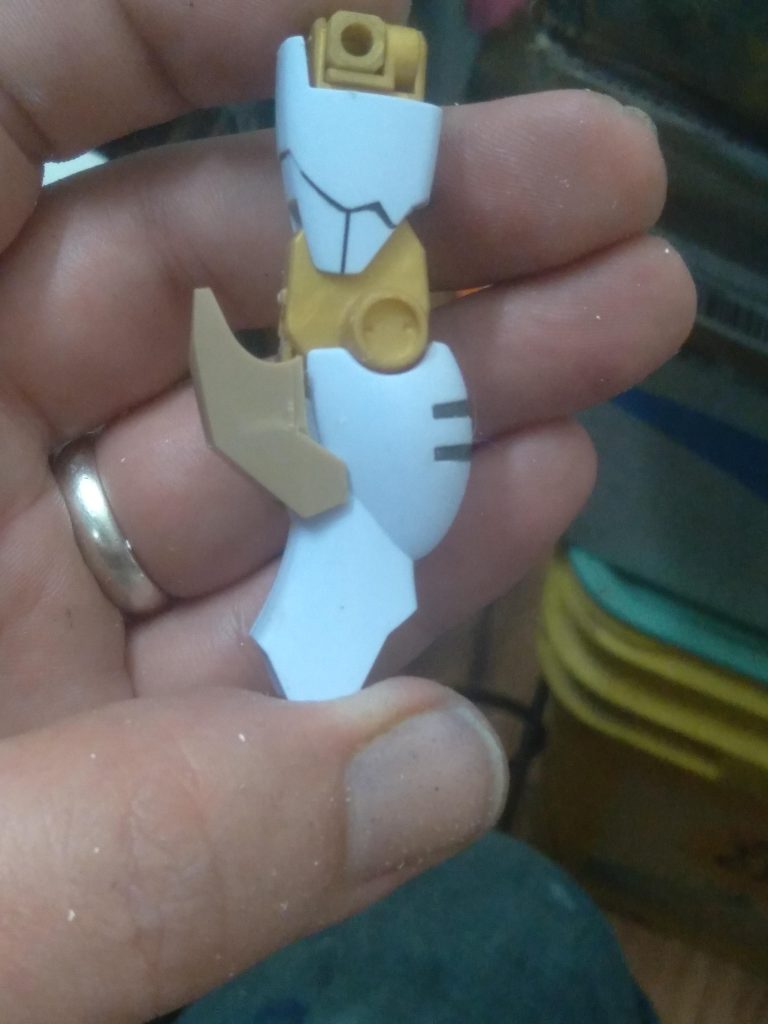 With the livelance heaven parts, I have already used the knee armor for something so I was forced to put together this using the upper leg armor from the ibo gundam gusion rebake. I had to trim some off it to get it to fit right. I still feel like it needs to be a little taller. I might add some plastic plate.