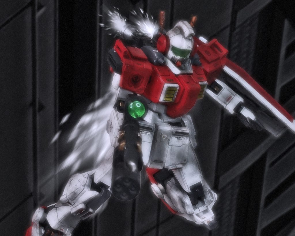 ネイマンとレイドはコロニー内で活動する上陸艇を護衛し現地に到着するやいなや、まさかの遭遇戦になる。お互い二手に分かれコロニー周囲を警戒していたがネイマンのいたコロニー港から敵MSが侵入を試みたのだ。 不意打ちでザク1機を中破させたが数ではまだあちらが勝る。力づくでもう1機を外へ押し出すと衝撃で動けないのかザクに隙ができた。そしてビームライフルの照準を合わせた瞬間だった。「ネイマン!ジュウイチジの方向敵影2、ザクだ!」レイドから通信が入る。ジムのメインカメラを向けると光の尾を引きながら接近するザクを捉える。