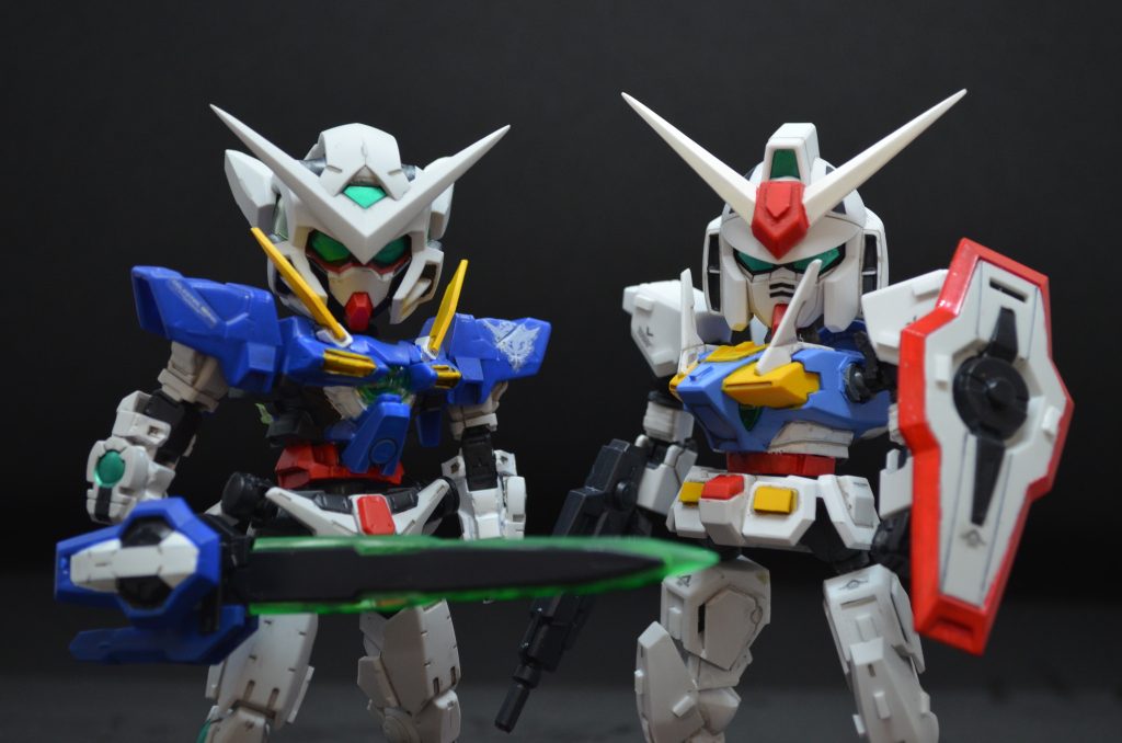 もとは同じ組織の機体ながら、ライバル機となったエクシアとOガンダムでツーショット。