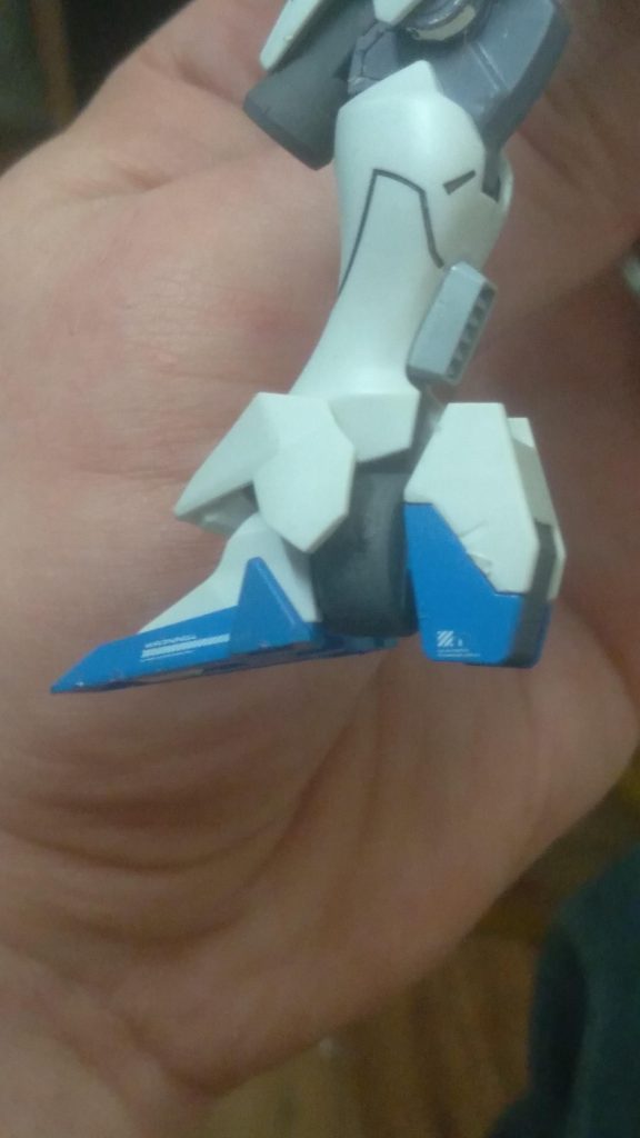 I filled in the hollow areas on the feet and beam saber holders on the backpack with putty