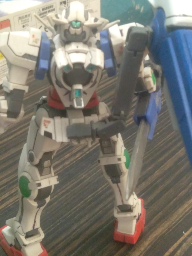 How I attach it to the back skirt. I also used the amazing exia clear parts on the condensers, uv tape and resin was used on the gn cables, metallic green gundam marker was used as well.