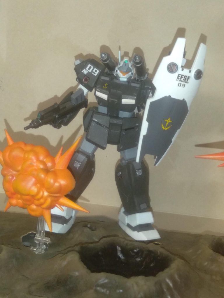 For an older HG kit, it has decent articulation. I changed the colors on mine slightly. I used NATO black, flat white, orange, dark grey, gunmetal, and used a metallic red gundam marker on the shoulder and leg thrusters