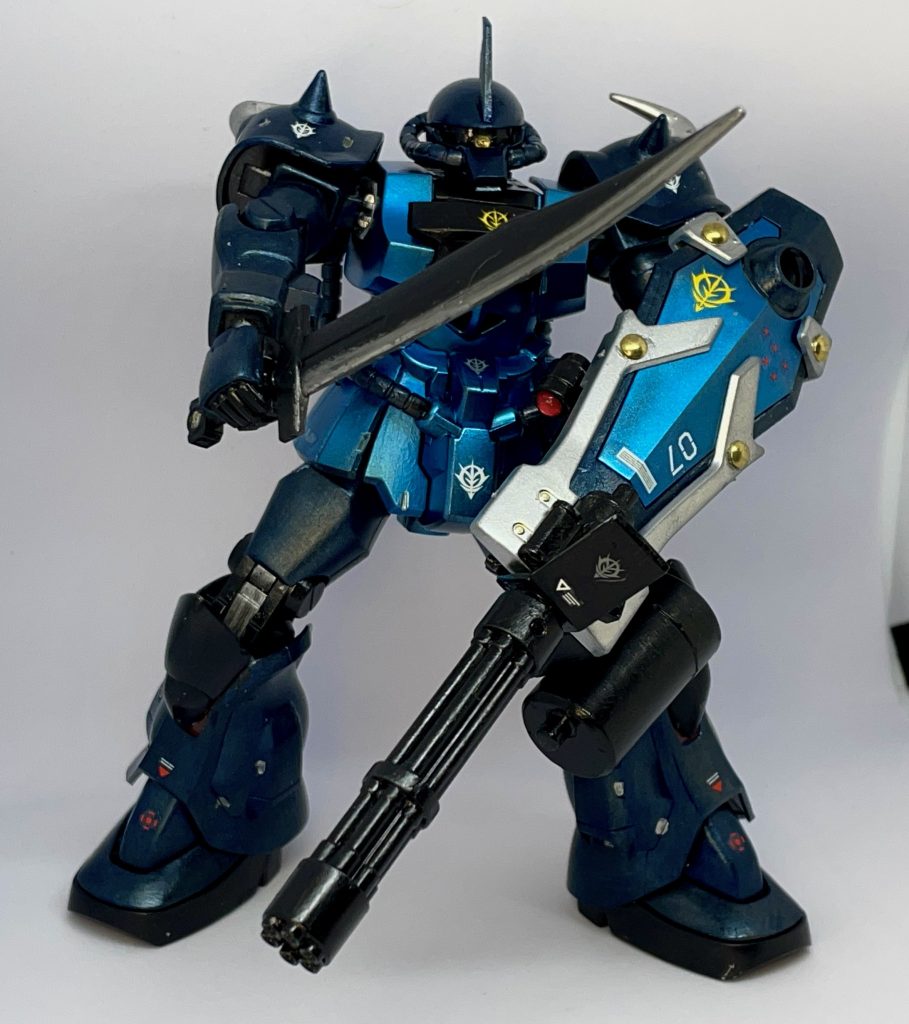 胴体はガンダムマーカーのコスモメタブルーをガンダムマーカーエアブラシシステムで塗装内部パーツ、武器は黒鉄色の筆塗り装甲及び頭部は筆塗りでアクリジョンのベースグレー→焼鉄色→クリアブルー→ガンダムマーカーエアブラシシステムでトップコート(ツヤあり)コレはキャンディ塗装という事でよろしいでしょうか?