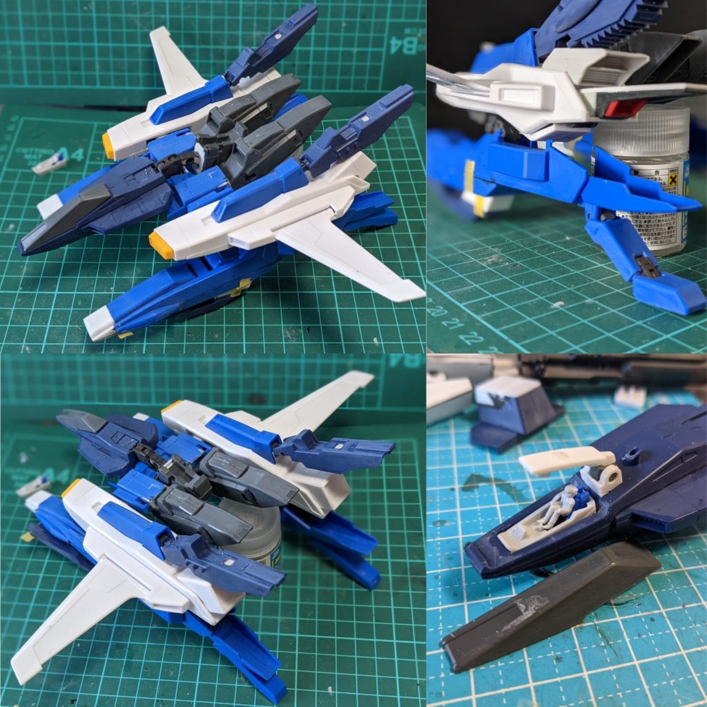 初期試作。MGのGディフェンサー(MGスーパーガンダム付属)を柱にMGビルドガンダムMk-2の強化ブースター他、ジャンクパーツを用いて全体を形づくっています。コックピットの展開機構、内部も再現しています。着陸用の脚部分は中央にHGキットの腕関節を仕込み大型化したポンツーンの高さに合わせて着陸できるよう調整しています。