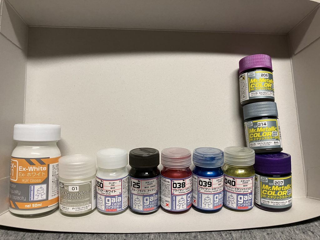 使用した塗料白装甲:EXホワイト→ダイヤモンドシルバー→クリアホワイトフレーム:スターブライトアイアンシェルユニット:プライマリーメタリックレッドカメラアイ:プライマリーメタリックイエロービームパーツ:プライマリーメタリックブルーライフルセンサー・襟元:GXアイスシルバー紫(薄):GXメタルパープル紫(濃):GXメタルバイオレット