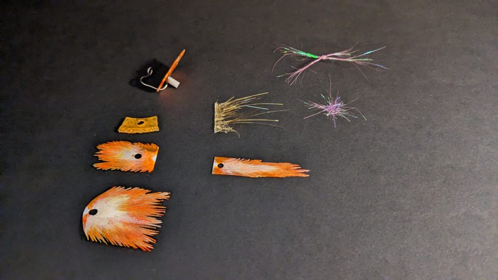 小ネタとしては、エフェクトを100均のプラ板、100均のハーバリウムに使う?やつのパールファイバー、イフリートのヒートサーベルのランナーとかで作ってみました。地面は4機並べるためにA4のフォトフレームを使い、前回のBD1号機の土台と同じ要領で作っています。土煙用の綿は完全に使いまわしです。