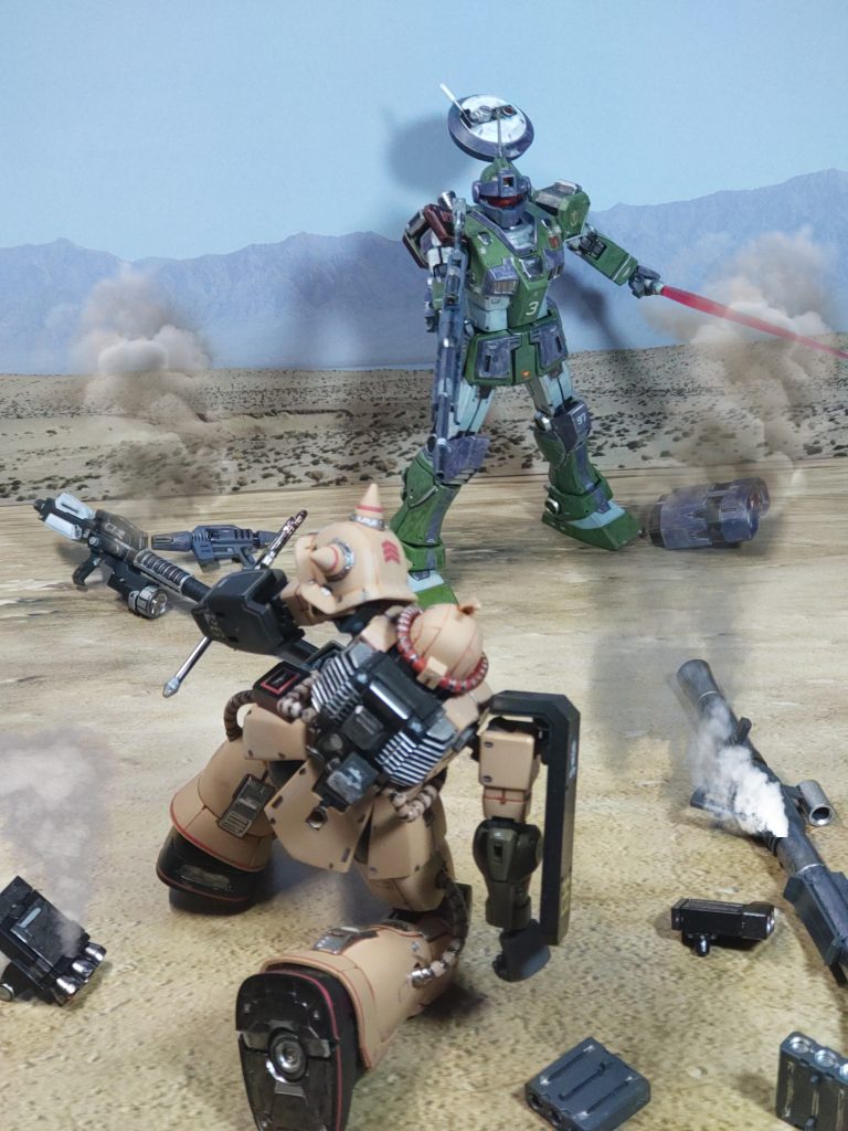 体勢を崩したザクDの眼前にビーム・ライフルが突きつけられる…「どうやら、武装は此方の方が多かったようだな…。チェックメイトだ」「……くっ、すまんみんな…後は頼む…」ジムSCのビーム・ライフルがザクDの頭部を貫いた勝者、ジム・スナイパーカスタム