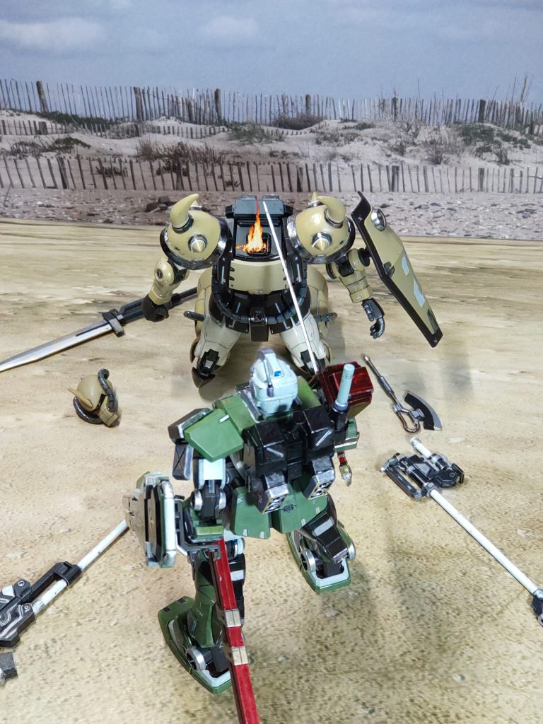 「ちくしょう………、そっちがメインウェポンかい…」力無く崩れ落ちるグフ「コクピットを潰す…、早く降りるんだな」「ようやく喋ったと思ったら……、優しいことで…」勝者　ジム・ストライカー