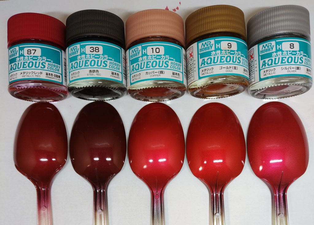 上からクリアーレッドでキャンディ塗装。右の3つを採用。