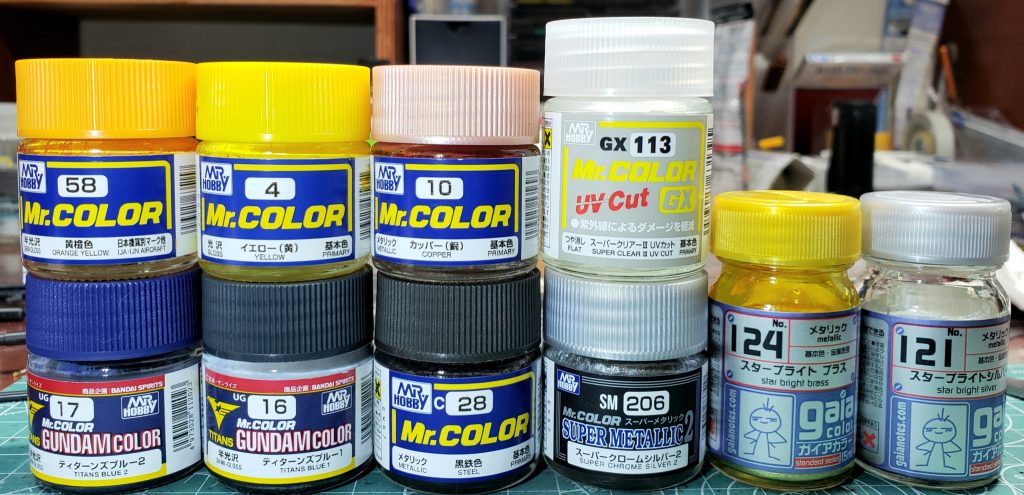 ・今回使用した塗料(表記なしはクレオス Mrカラーラッカー)ティターンズブルー1ティターンズブルー2黒鉄色 黄橙色イエロー(黄)カッパー(銅)スーバークロームシルバー2スターブライトブラス(ガイアカラー)スターブライトシルバー(ガイアカラー)スーパークリアII UVカットサーフェイサー1500ブラック・使用したコンプレッサークレオス L5・ハンドピースPS-289WAプラチナ2.0 (0.3㍉)PS-266WA (0.5㍉)