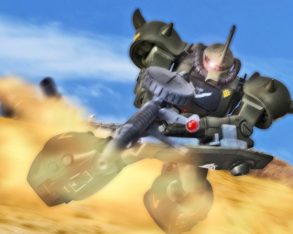 「当てなくていいっ!トーチカは前面に砲弾を叩き込め!」オリバーは基地周辺を囲むトーチカに指示をだすと自身もトーチカの射線に入らぬよう移動する。グフ飛行試験型はそれまでのMSと違い地面を滑る様に動く。脚部の熱核ジェットエンジンが機体を浮かし大型バックパックがその補助と機動を担っている。その速さはザクやグフの2足歩行とは違い、雲泥の差があると言っても過言でなかった。