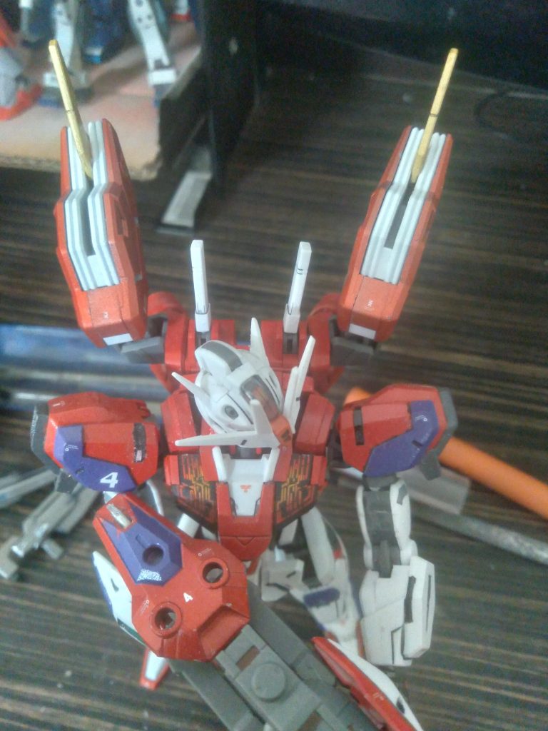 I also did something with the rebuild. I painted the grey vent detail white on the backpack