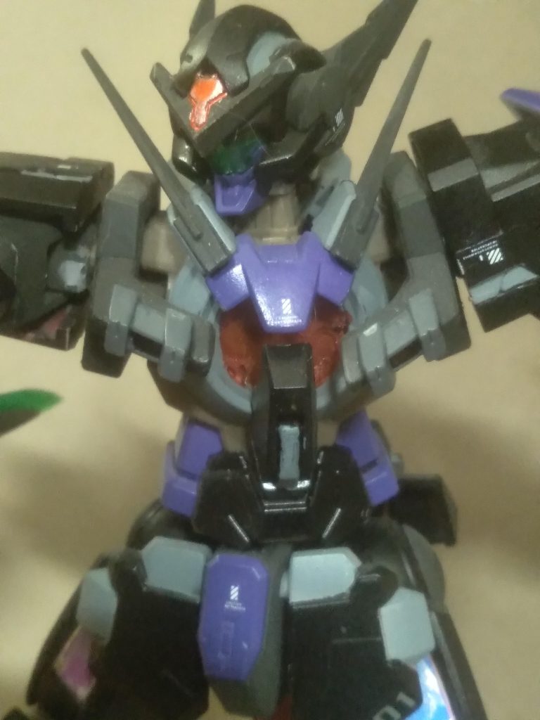 The chest condenser I made myself. I used a metallic red gundam marker and added it first. Allowed it to dry and applied the uv resin on top of it. I like how it looks