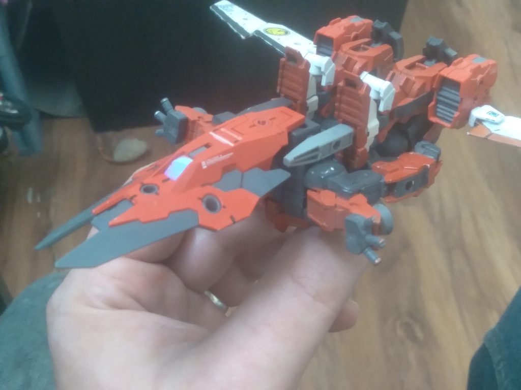 The shoulders have flare launchers for defensive purposes