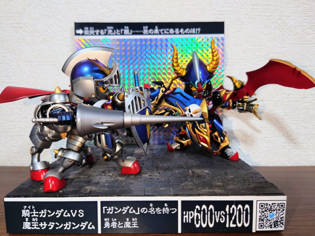 ➡︎「激突する「光」と「闇」…旅の果てにあるものは!?」このカードダス風のジオラマにて出展する予定です。前回のVKM10横浜ボークスにて銀賞を取らせていただいたナイトガンダム(通常モード)をケンタウロスモードで友情出演させてます。https://gumpla.jp/sd/1515635