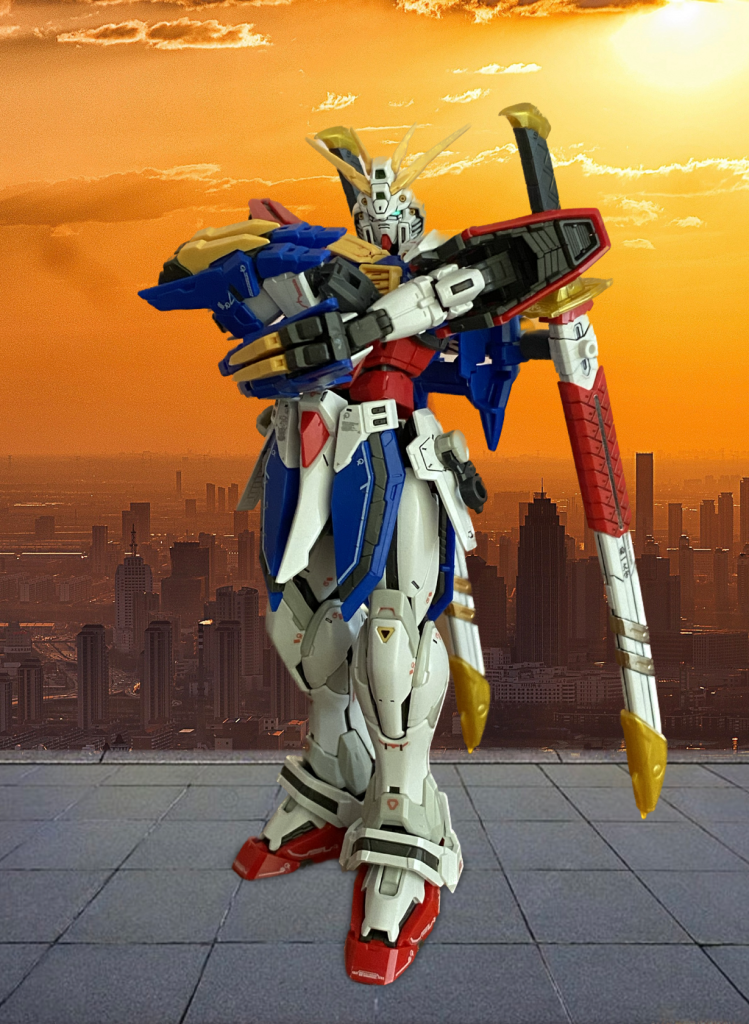 そして最後はメインにも採用したこのショットを‼️もちろん後期OPの最初のシーンのイメージです♫…二刀流バージョンですが（笑）腕組みが自然に再現できるRGゴッドガンダムの可動域に改めて脱帽です。このオープニングの腕組みシーン、めちゃくちゃ好きなのでこのようなかたちで再現できて胸熱です‼️🔥【編集後記】今回、スマホをアップデートした際に、色んな機能が追加され、画像編集の幅が増えたことが今回の投稿のきっかけです。実はゴッドガンダムをよりカッコよく撮影するために、ジオラマの準備を考え始めていた頃だったので、この機能追加は最高にテンション上がりました❗️♫もちろんジオラマで再現した方が、臨場感は出ると思いますが、環境が整っていない私みたいな方にはお手軽なのでオススメです😆ゴッドの腕組みシーンの再現は夢だったのでめちゃくちゃ嬉しかったですね♫もしよければ、どの写真が良かったよ👍とかこんなシーンを再現してみては？などのご意見いただけるととても励みになります❗️HGFCガンダムローズに続くシャッフル同盟のガンプラ化。RGのシャイニング、マスターは？！画像合成機能駆使して、色んなシーン再現したいので、リリース待ってますよ‼️‼️‼️最後までご覧いただき、ありがとうございました❗️
