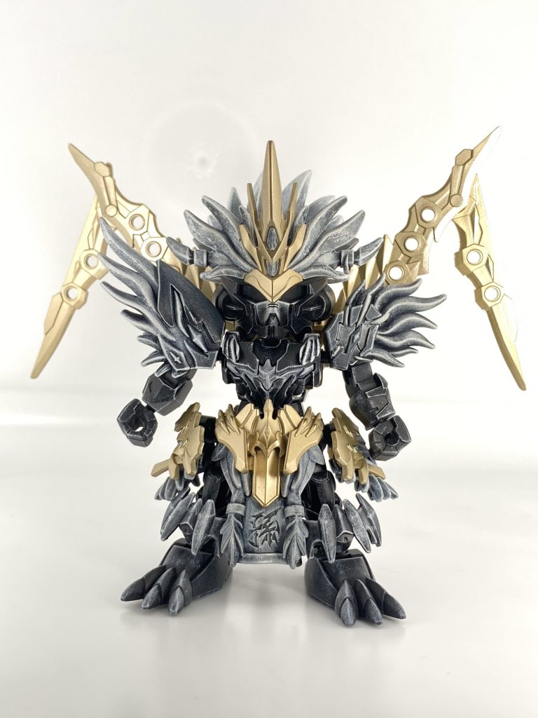 黒下地にホワイトでドライブラシを行い、純色を調合した塗料でグラデーションをかけました。