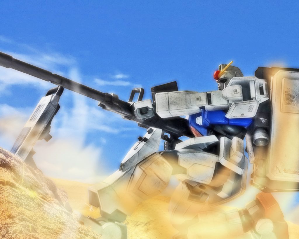 「隊長、西側トーチカ群に攻撃を開始します!」サンダースは180mmキャノンを地面に刺したシールドで安定させると砲撃を開始した。「了解した。そこを殲滅して戦車部隊の進入路とする。頼んだぞ、サンダース」「地図じゃ分からんけどこんな抜け道があるとわね」エレドアは片手でヘッドホンを抑えながらコンソールパネルのマップを見た。「元々小さな川だったんだけど干上がっちまってさ。そこが基地から丁度死角になるんだよ」「流石だな~キキ」ミケルは素直に感心する。キキはシローの陸戦型ガンダムから降りホバートラックに乗り込んでいた。「だから川底に沿って行けばジオンには突然現れたみたいに見える筈だよ」「よし、俺とカレンは基地に直接奇襲をかける!」シローはそう言うと機体を走らせた。