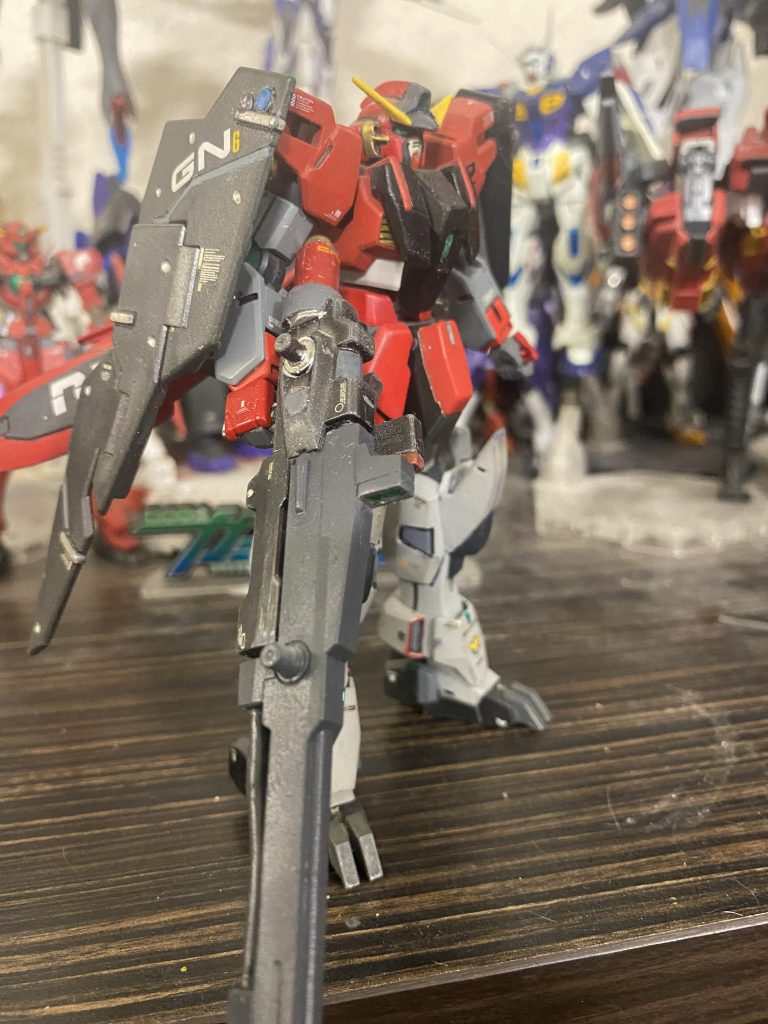 GN-R2 Gundam Antares The long range shooter of the team. It's equipped with the gn lightning rifle. It has extra sensors for targeting enemy units. Beam Saber handles are stored in the side skirts. It has an optional booster unit that can be equipped to the back skirt. The gn full shield can be mounted to the shoulders via hard points.