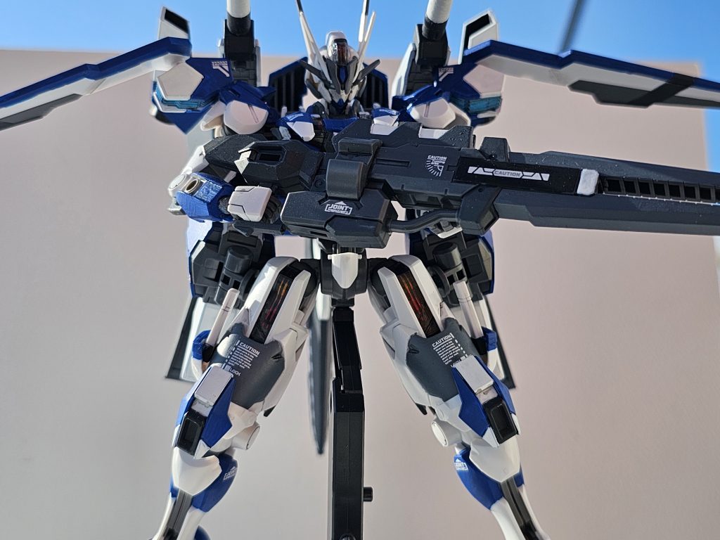 対要塞用戦術パック。長距離航行、高い火力をガンドライに付与するパックであり専用のビームライフルを装備する。このビームライフルは長射程と高い命中力を誇りテロリストと対峙したエアリアルリビルドのビームライフルの研究、量産機コンペティションで破れたカンティークの主兵装であるビームランチャーをベースに製作されている。