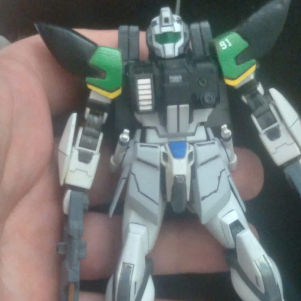 Could be a future mass produced mobile suit? The parts list is as follows:Head: powered gmTorso: ground GundamWaist: build StrikeArms: build StrikeLegs: StrikeBackpack: custom made using the geminass Backpack along with ez-sr parts