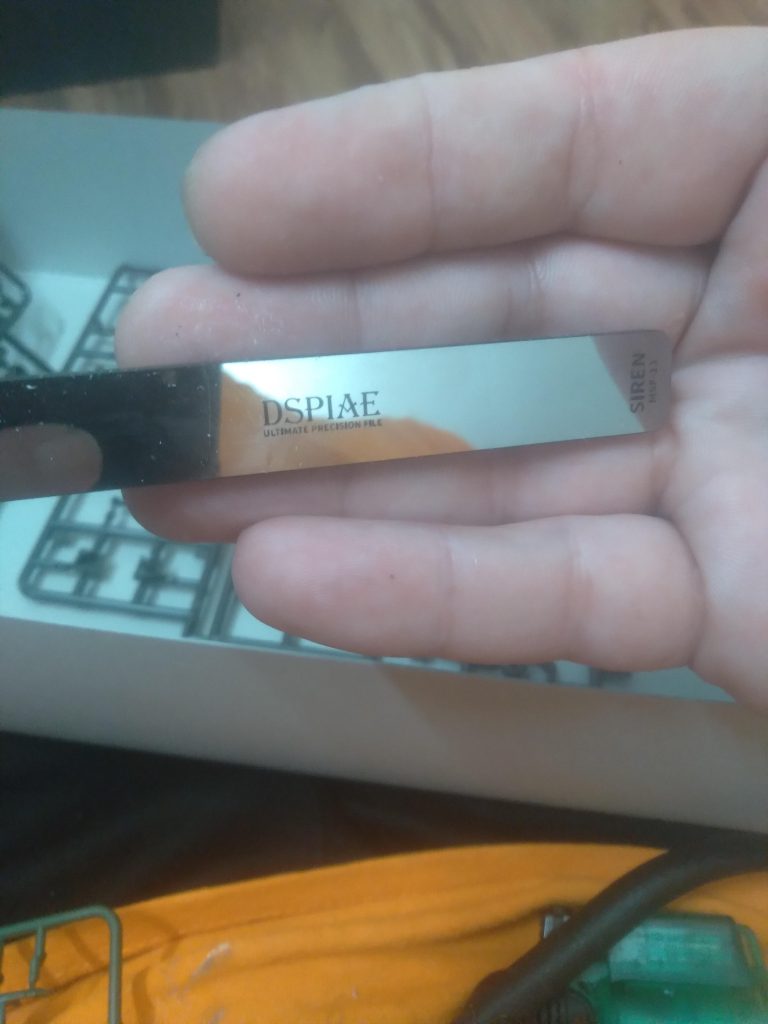 The glass file I used on this kit. The dispae siren. It's a really good file to remove nub marks