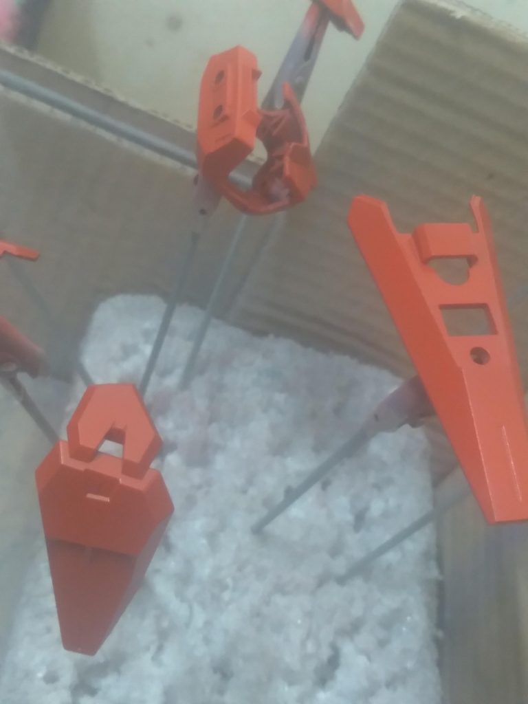 After spraying red on the parts