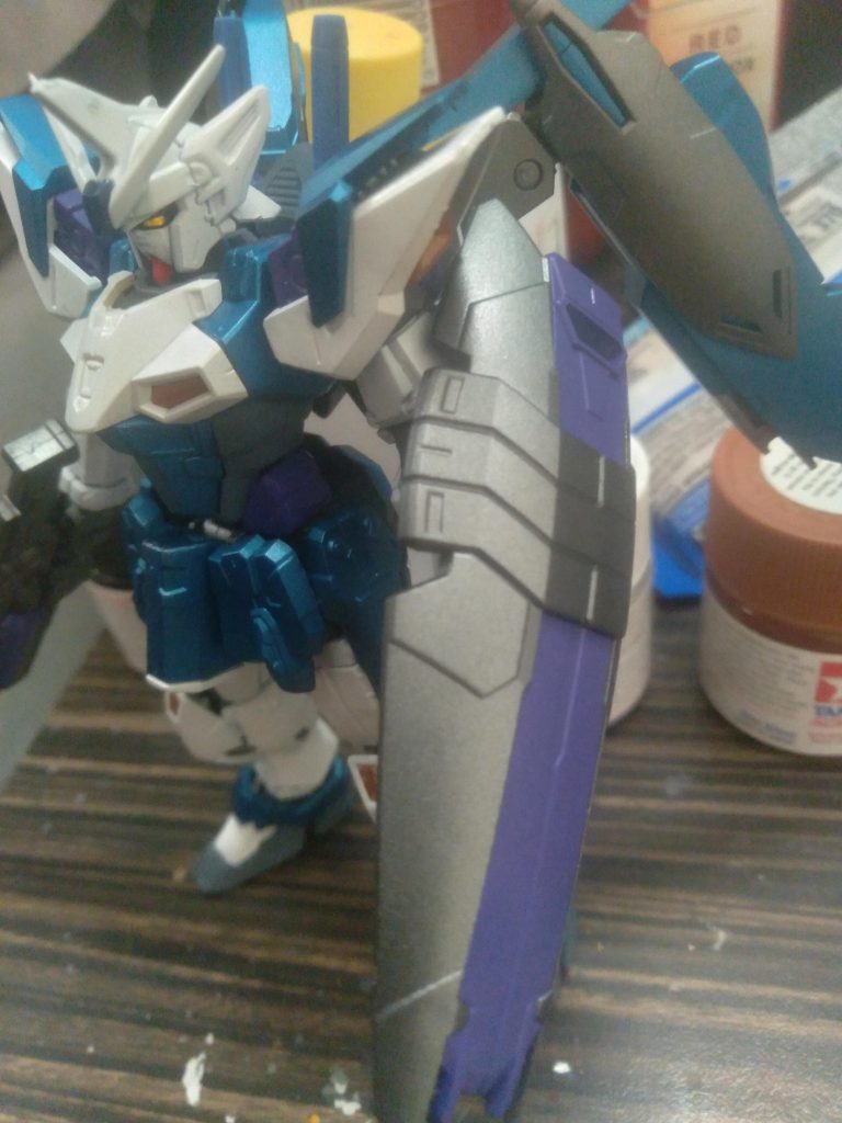 I was able to use the leftover beam saber racks from my geminass on his. I glued them to the backpack and trimmed off the plastic so the wings still move