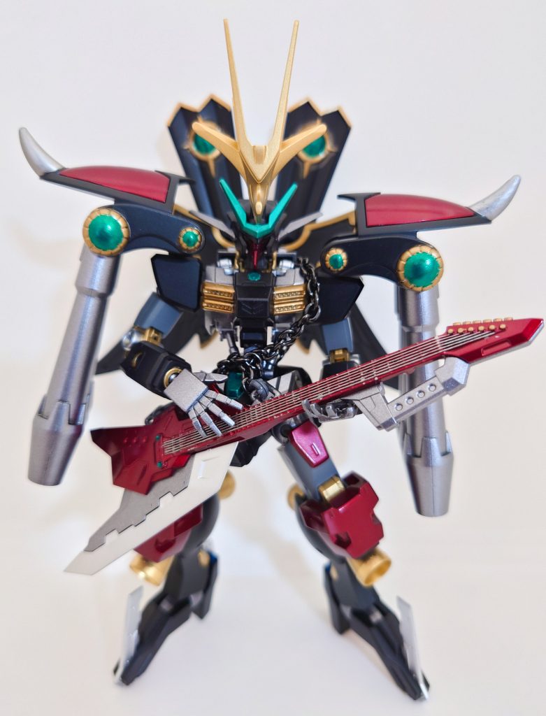 ギターを持たせてみました。