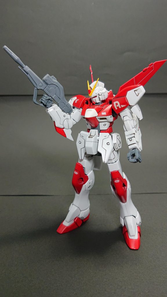 ～以下妄想内容～Vガンダムの後継機開発にて、ミノフスキードライブの開発が完了する前に組み上げられた機体。ミノフスキードライブ未搭載型であり、機体の性能試験目的で開発されテスト用に運用された先行試作機。ミノフスキードライブがあまりに高出力だったため、疑似的に性能を再現するため翼を大型化したコアファイターとなっており、正式なV2のようにV字の翼のように見える。ただリガミリティアのシンボリックな意匠の「Ｖ」はこの時期には設定されておらず、胸部の装甲や頭部アンテナにも採用はされていない。