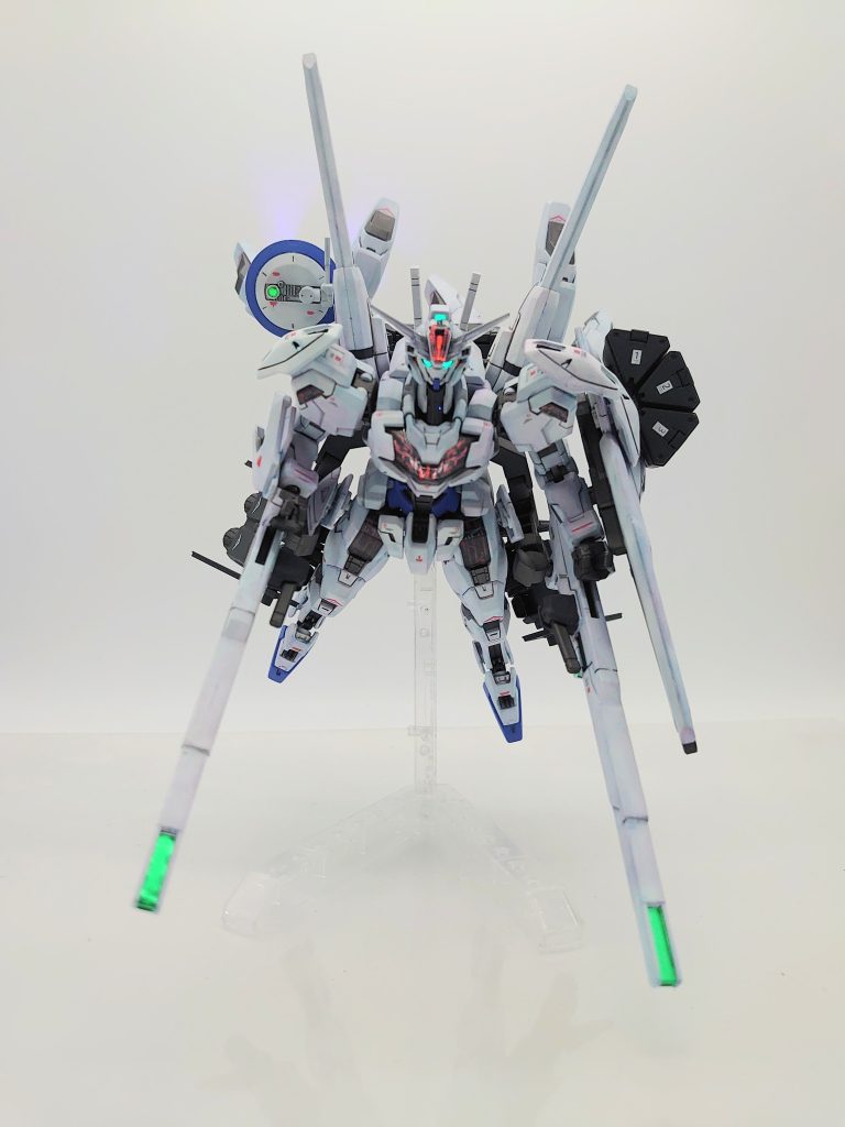 ツインバリアブルロッドライフルで安定感と機動性、火力を増強。スラスターを兼ねているのでウェイトによる機動力とロスは無く寧ろ向上している。WエスカッシャンはエリクトOSのサポートを受けられないので防御とビットモード外装による機動力アップ。