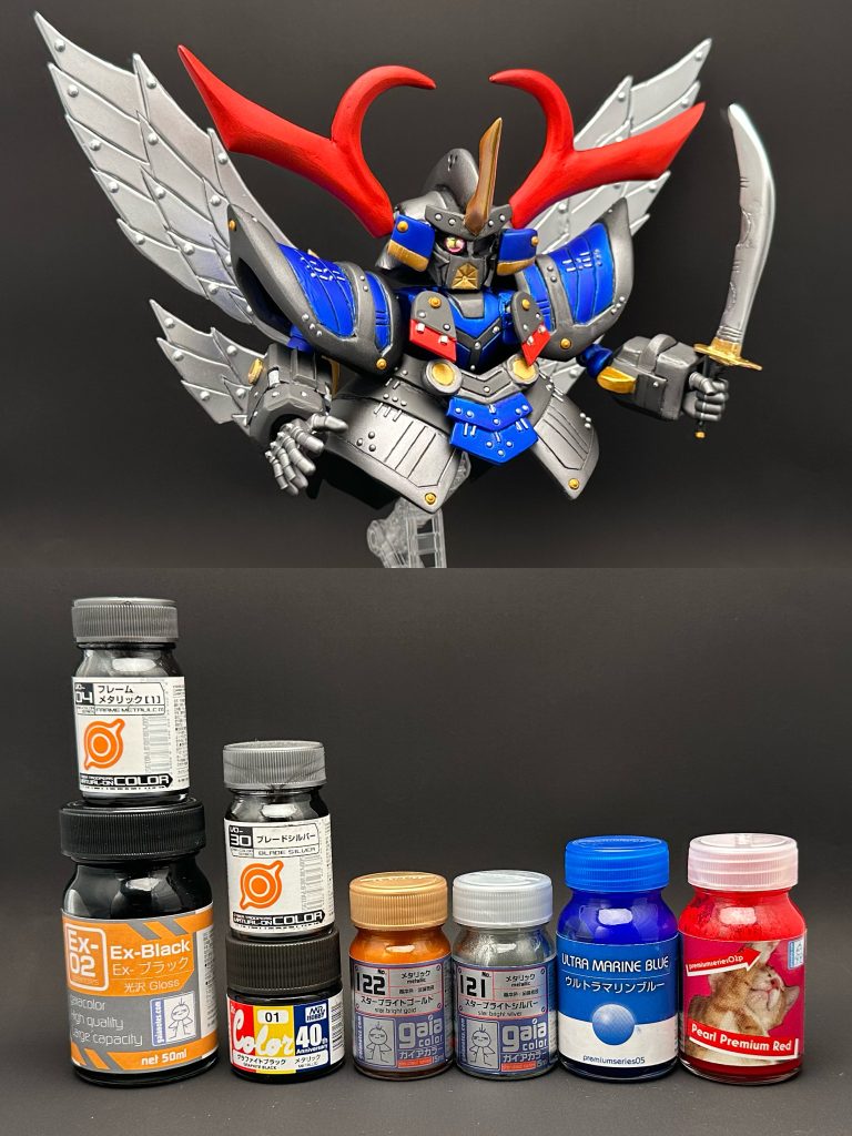 塗装色メモ📝共通下地　黒サフ＋EXブラック赤青の下地は、＋スターブライトシルバー銀　フレームメタリック1黒　グラファイトブラック青　ウルトラマリンブルー赤　プレミアムパールレッド翼　スターブライトシルバー金　スターブライトゴールド赤や青などは、艶消しでマットキャンディ塗装にしています。全身が金属製のからくりでできているキャラということで、塗装でずっしりとした金属感を表現してます。以上、最後までご覧頂きありがとうございました。